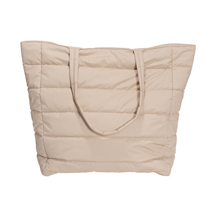 Beige kassi on heijastavaa materiaalia.