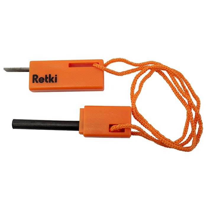 Retkitulukset kantohihnalla. Tulentekovälineet haastavissa olosuhteissa. Oranssi väri auttaa erottumaan retkeilyvälineiden joukosta