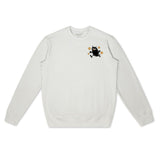 Vaaleanharmaa Muumi-collegepaita jossa seikkailee Haisuli. 