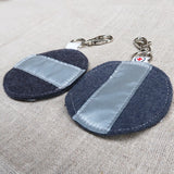 Pyöreä heijastin sarkakankaasta