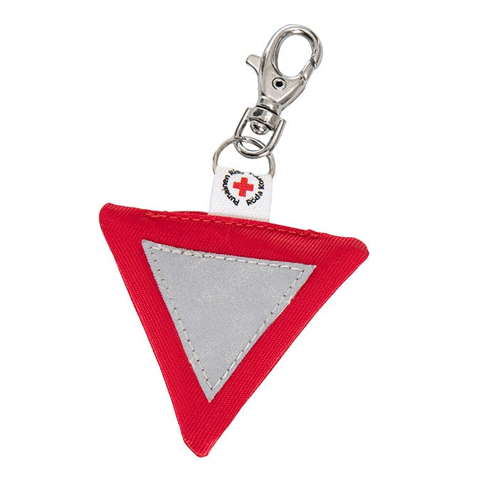 Pehmeä kolmioheijastin on valmistettu kankaasta.