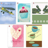 Korteissa aiheena lentokone, muffinssi, sydän, kahvikupit ja puput.