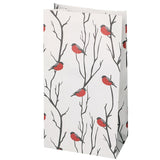 Paperinen lahjapussi, jossa punatulkkuja. Sopii joululahjojen paketoimiseen. 