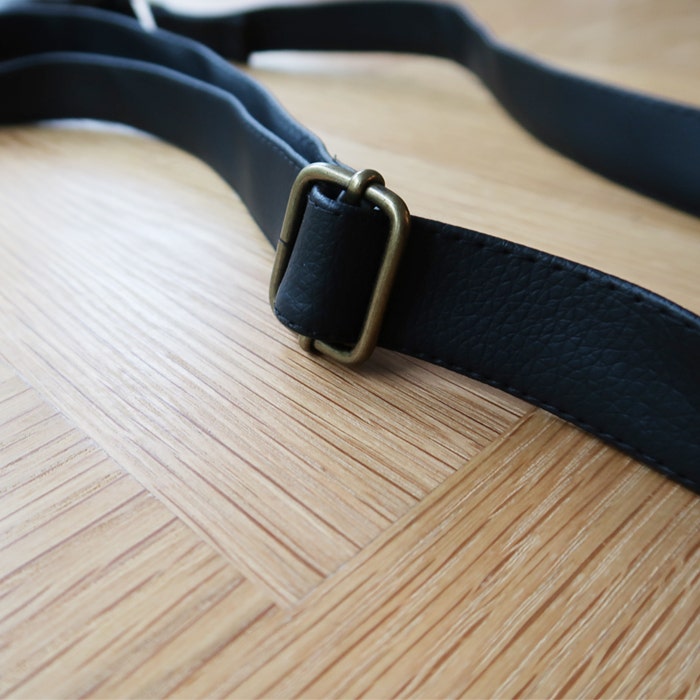 Olkalaukku sarkakankaasta