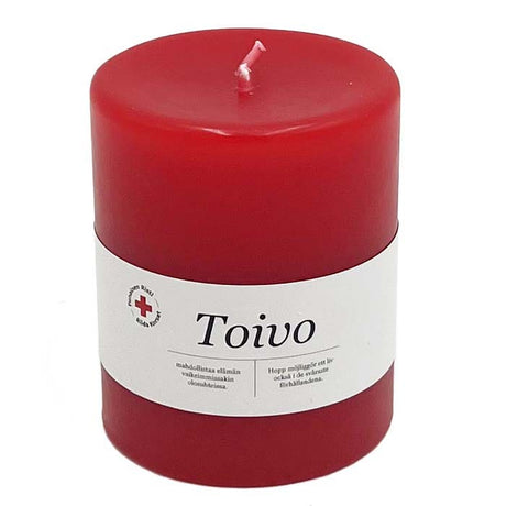 Kirkkaanpunainen kotimainen pöytäkynttilä Toivo.