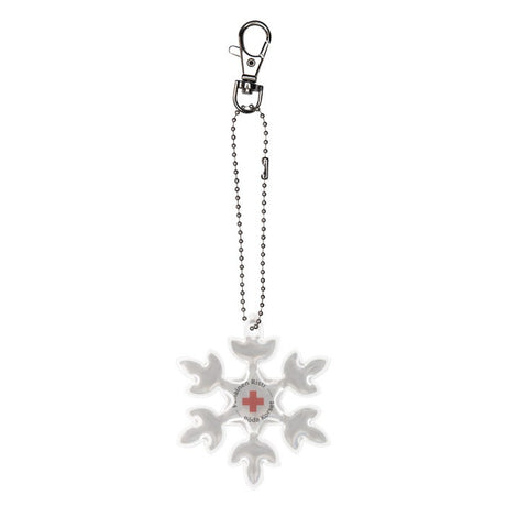 Hiutaleen muotoinen heijastin Punaisen Ristin logolla